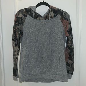 Maternity sweater with floral accents